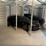 Modular storage unit setup with two cars inside at Potter Storage in Morton, IL